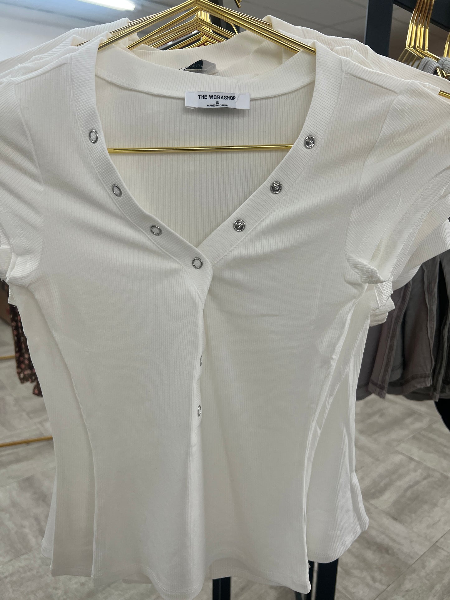 Half snap button knit top