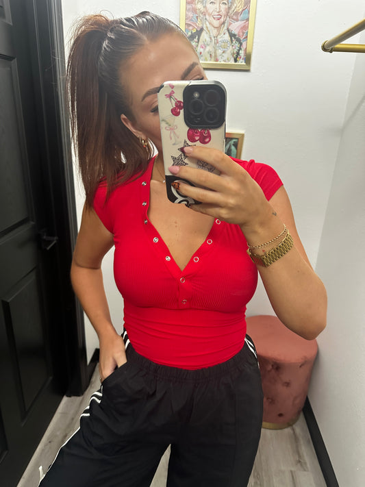 Half snap button knit top
