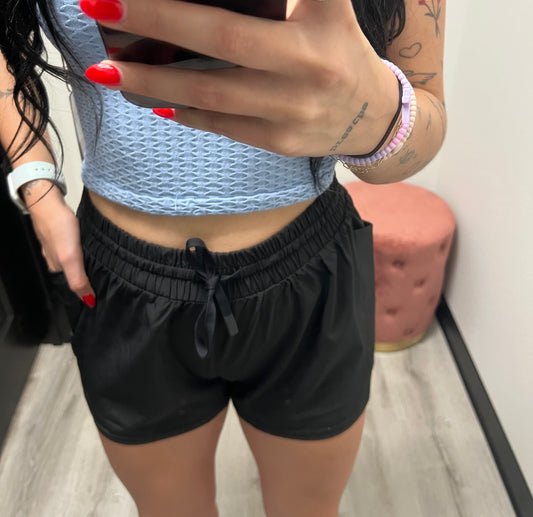 Athletic shorts with side pockets